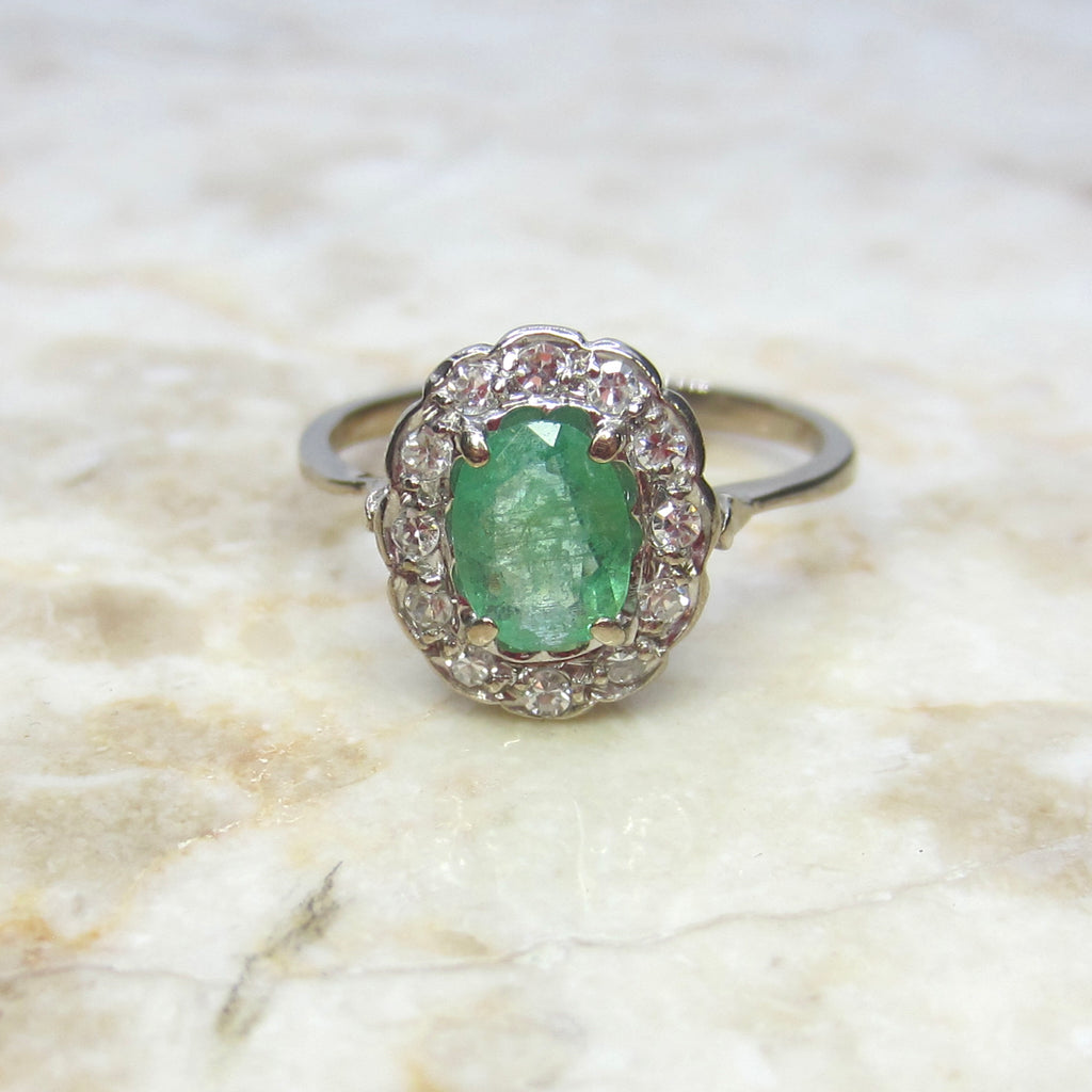 Vintage H. Stern 18k Emerald and Diamond Halo Ring