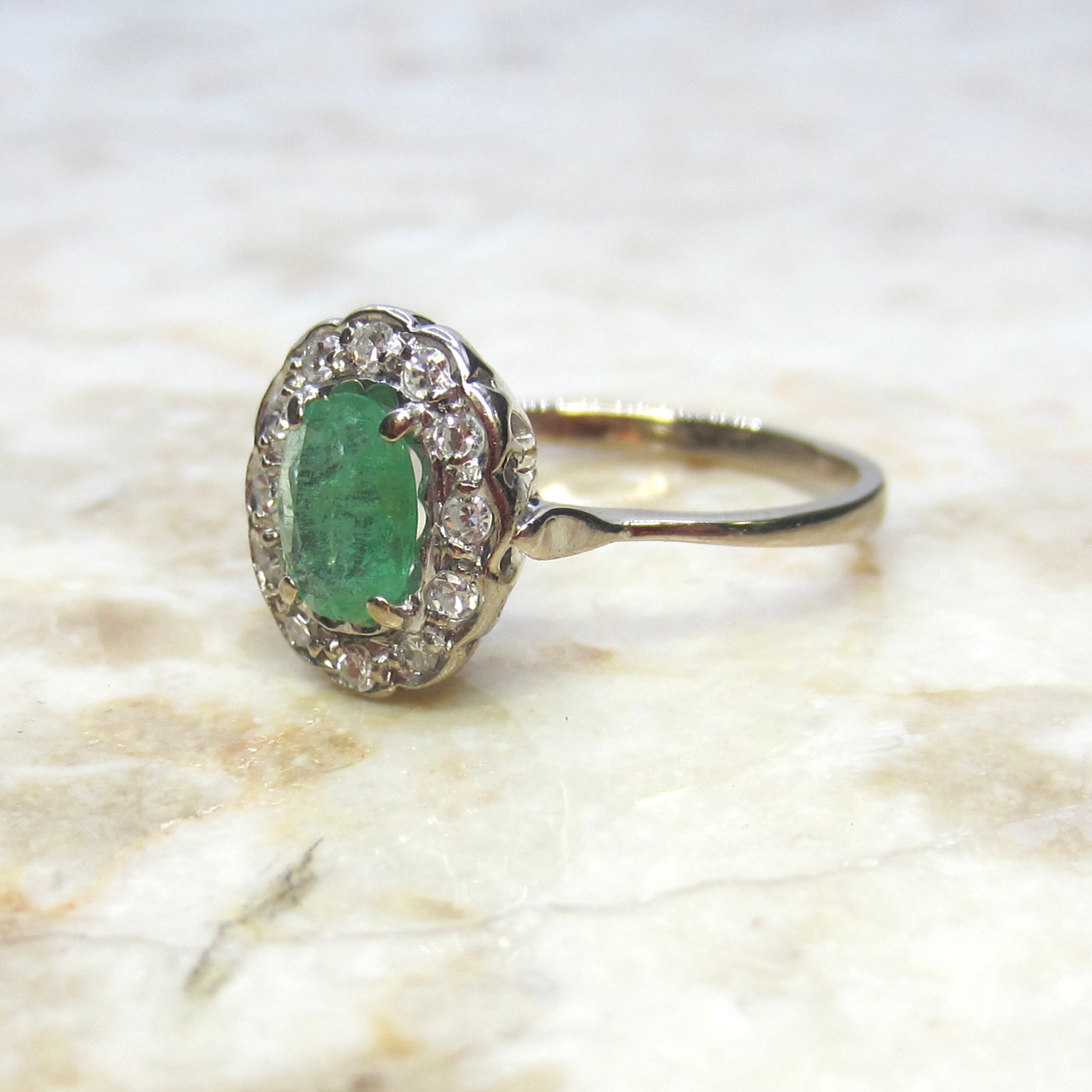 Vintage H. Stern 18k Emerald and Diamond Halo Ring