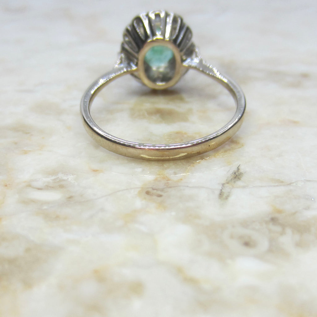 Vintage H. Stern 18k Emerald and Diamond Halo Ring