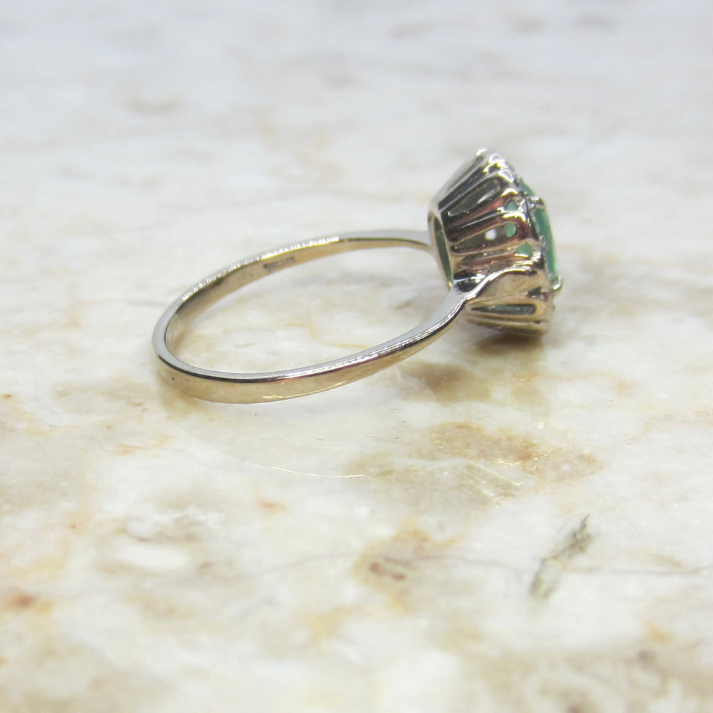 Vintage H. Stern 18k Emerald and Diamond Halo Ring