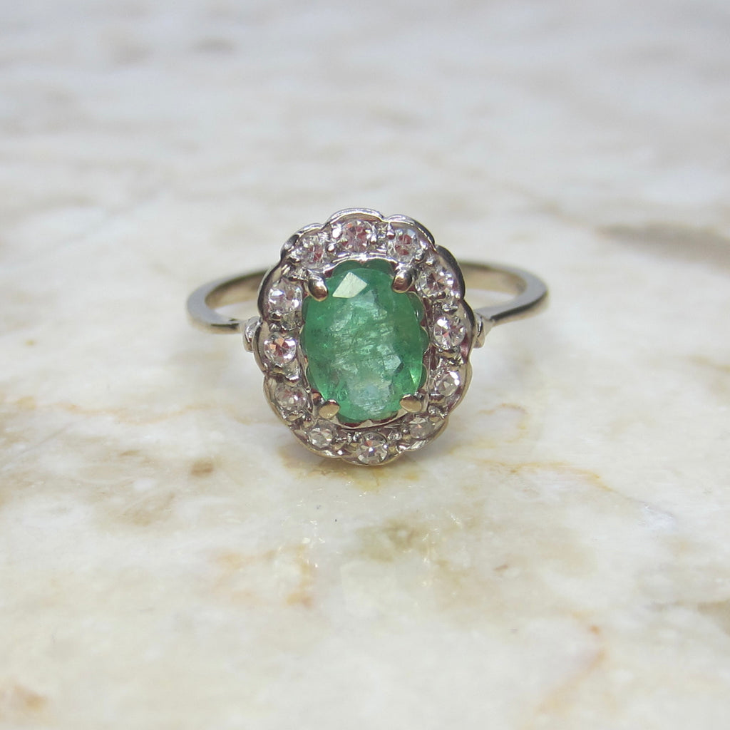 Vintage H. Stern 18k Emerald and Diamond Halo Ring