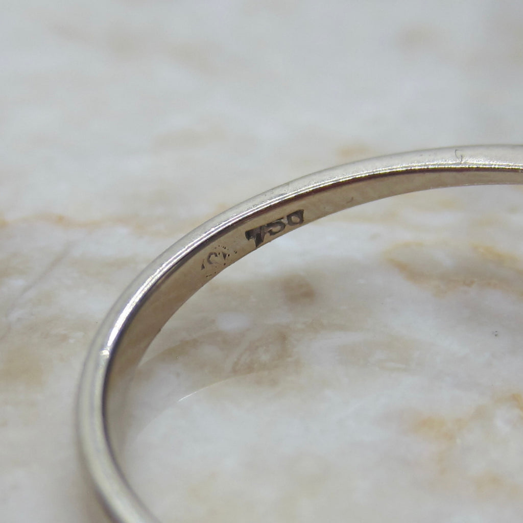 Vintage H. Stern 18k Emerald and Diamond Halo Ring