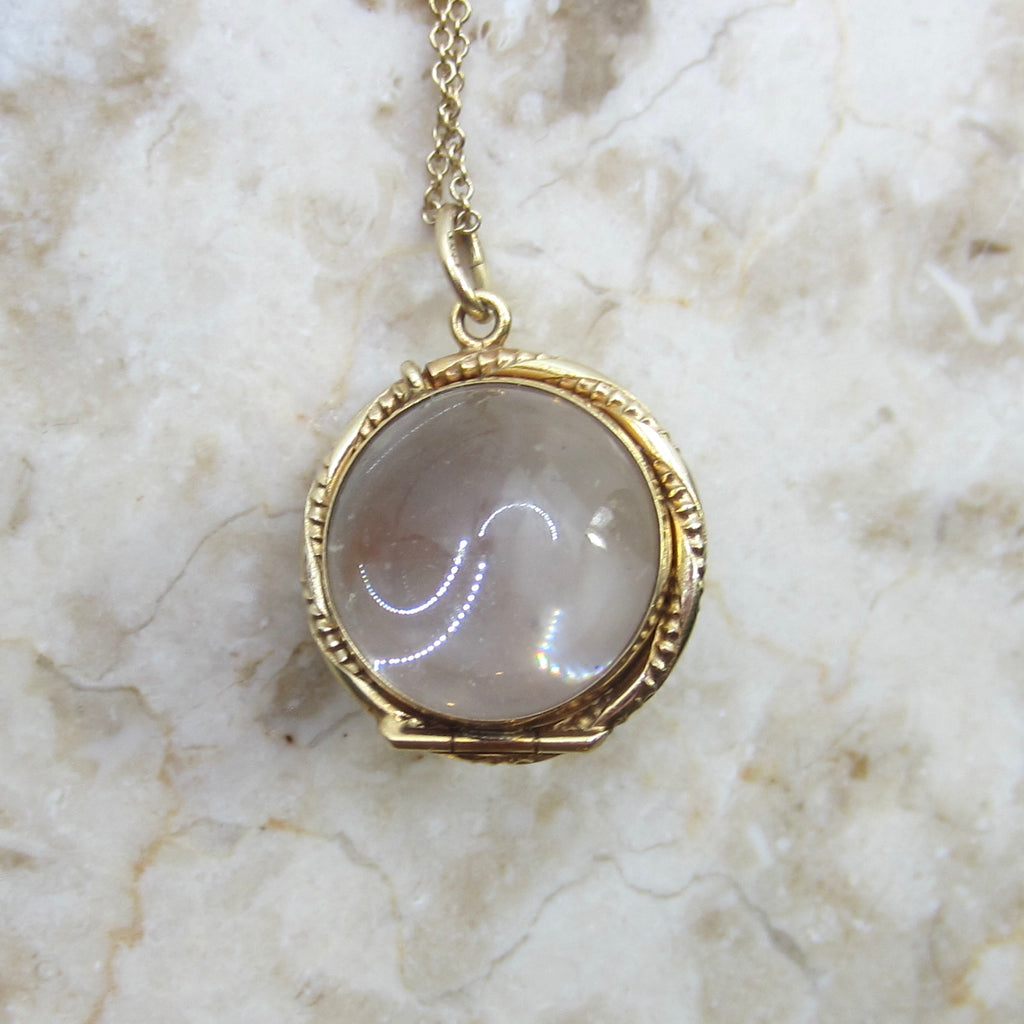Antique 14k Gold Pools of Light Crystal Locket
