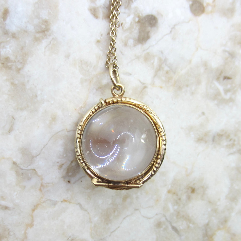 Antique 14k Gold Pools of Light Crystal Locket