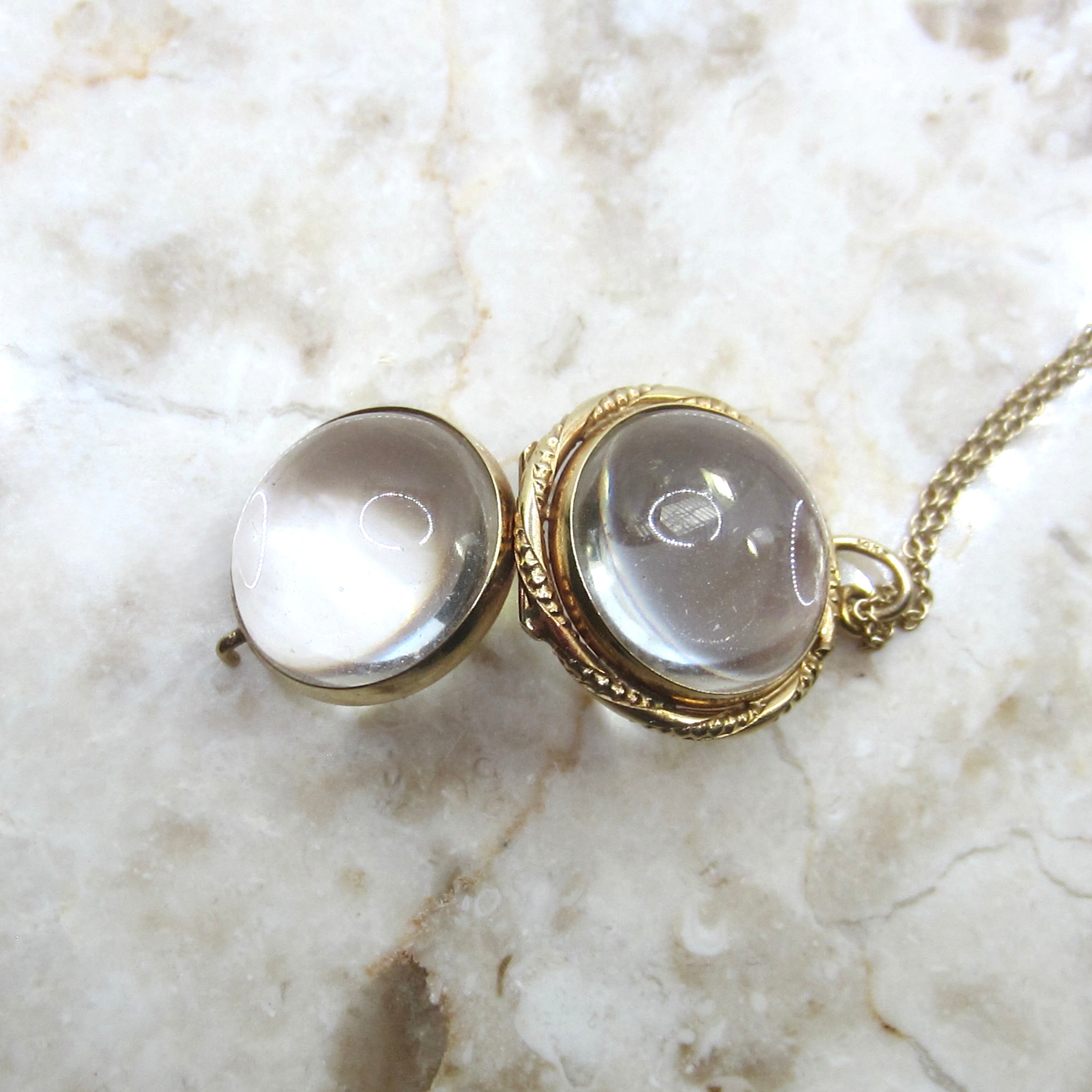 Antique 14k Gold Pools of Light Crystal Locket