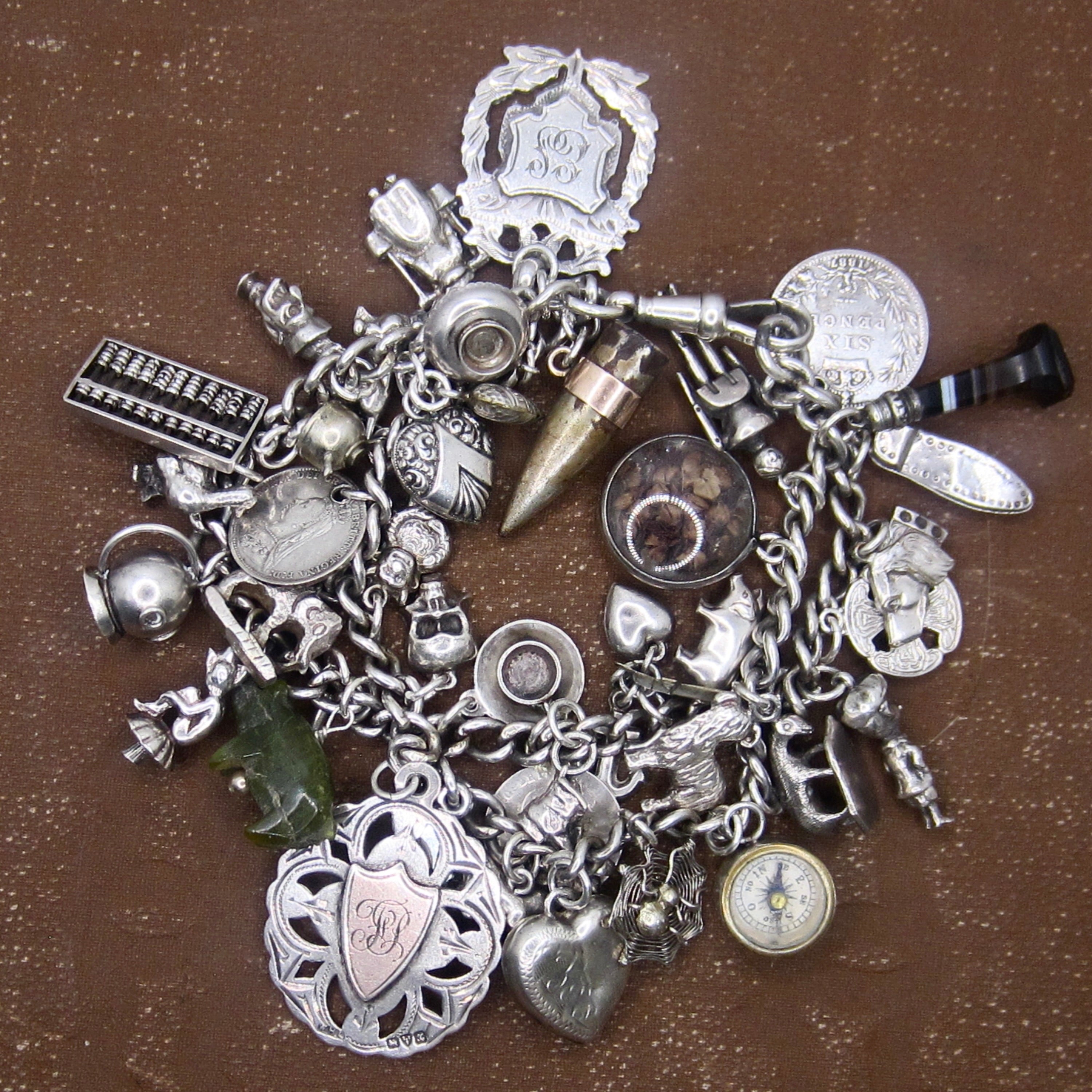 Antique Sterling Silver Charm Bracelet Rare Charms Hallmarked Peg Doll Dog Animals