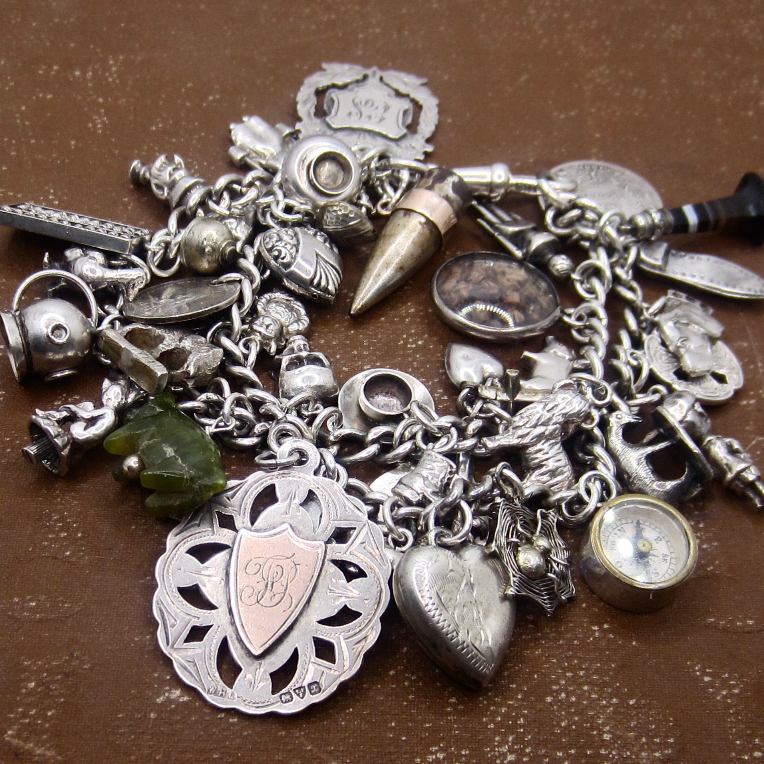 Antique Sterling Silver Charm Bracelet Rare Charms Hallmarked Peg Doll Dog Animals