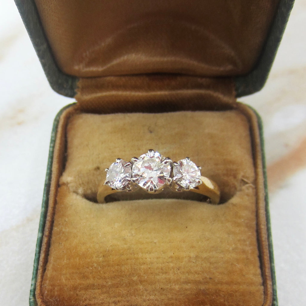 Diamond ring in an open vintage jewelry box