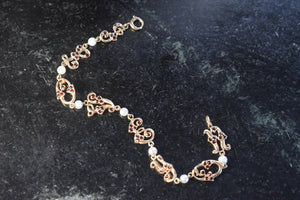 Antique Edwardian 14k Gold Garnet and Cultured Pearl “I Love You” Bracelet