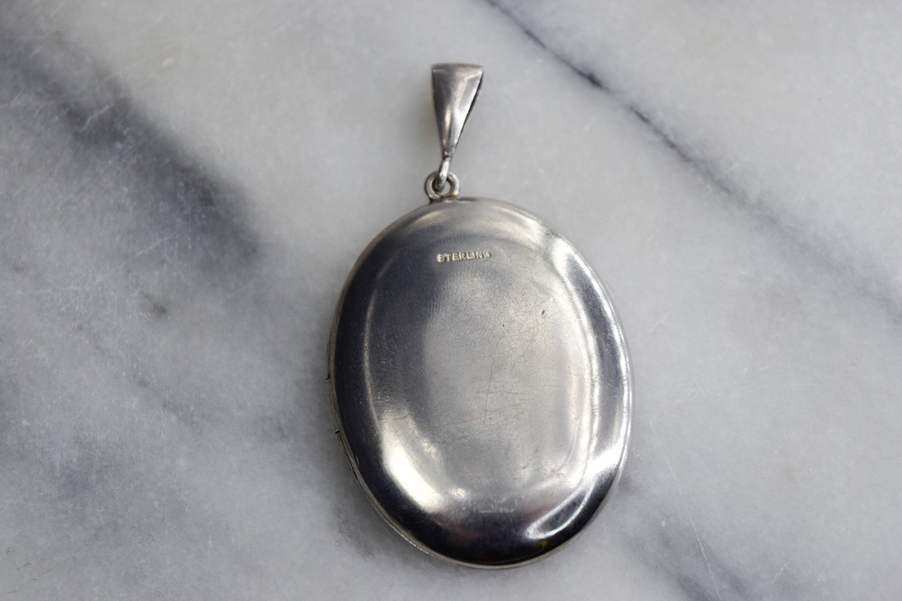 Antique Sterling Silver Locket with Engraved Flowers and Ivy